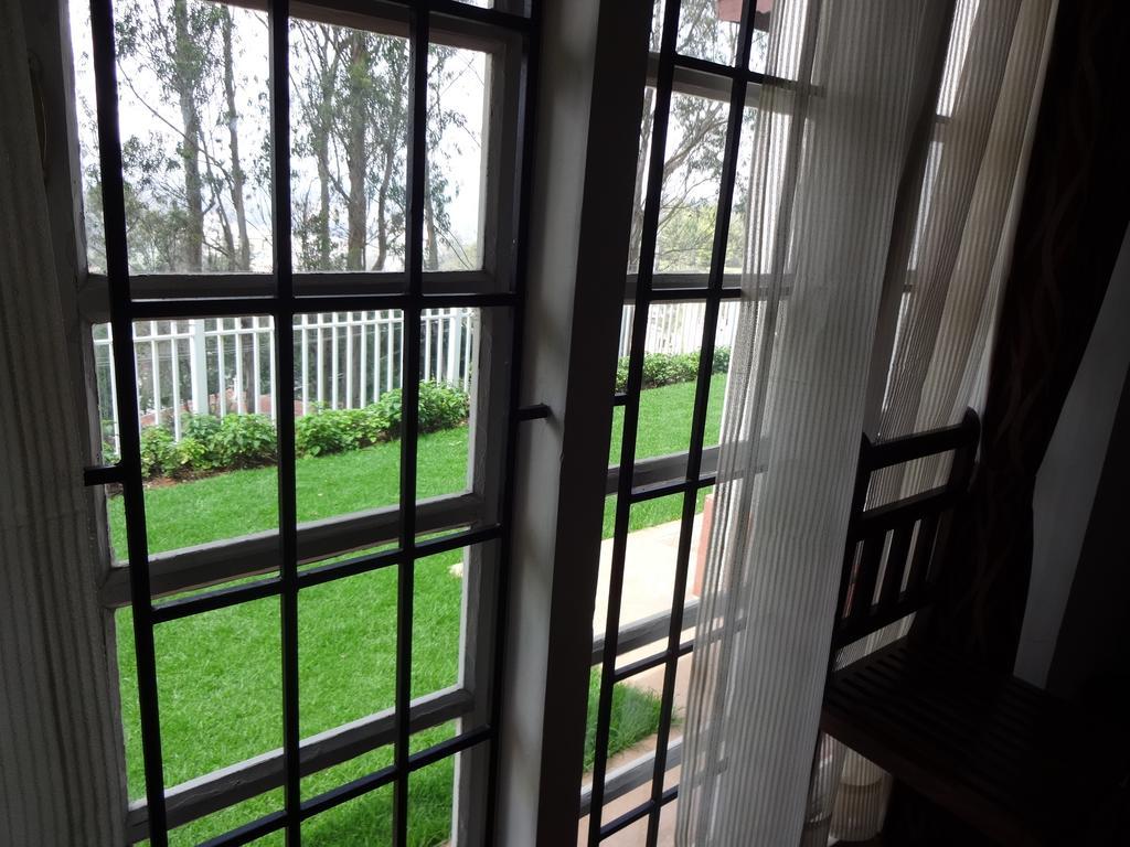 Irinjalakuda House Appartement Ooty Buitenkant foto